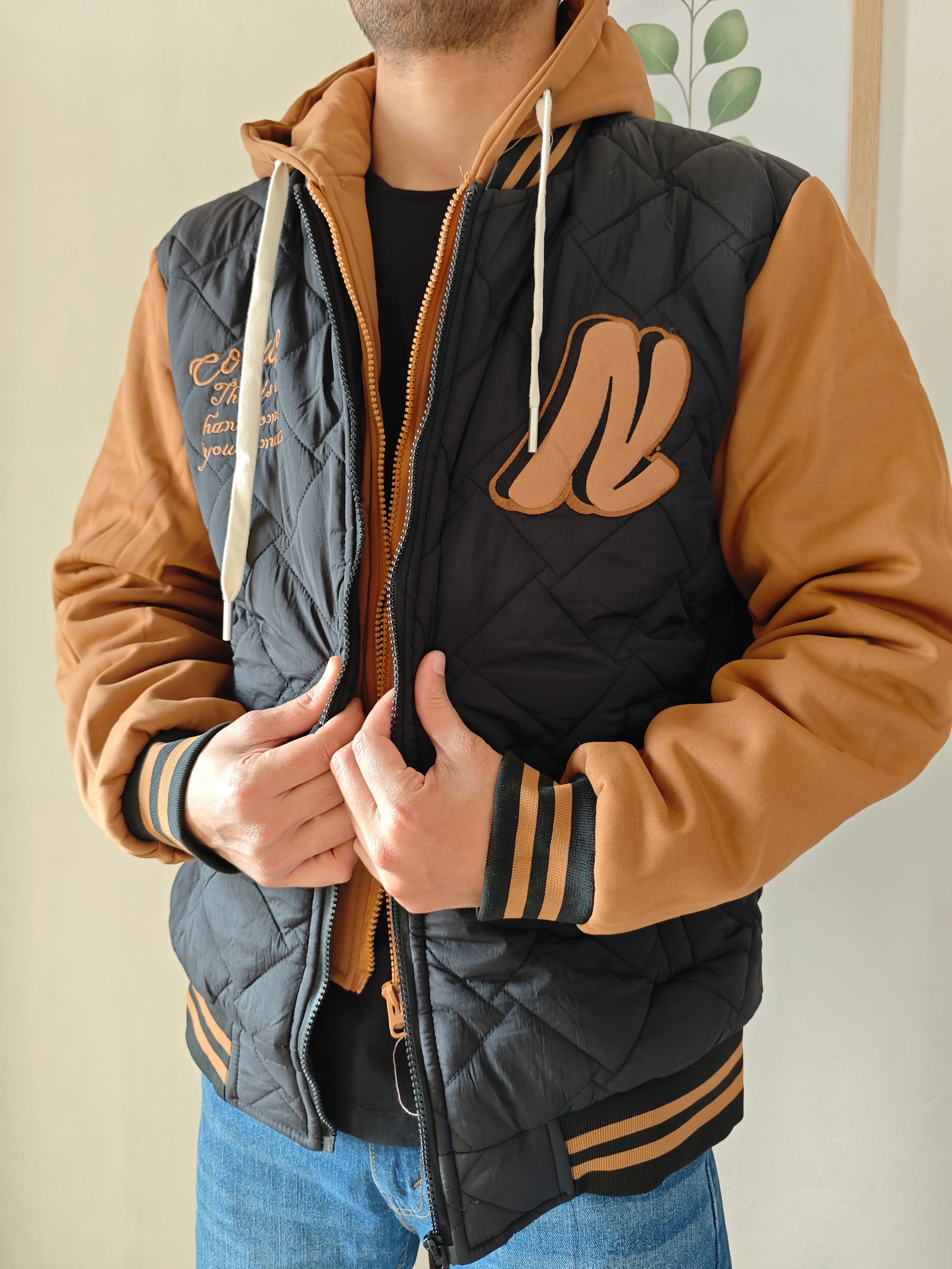 Dual Layer Hooded Jacket.
