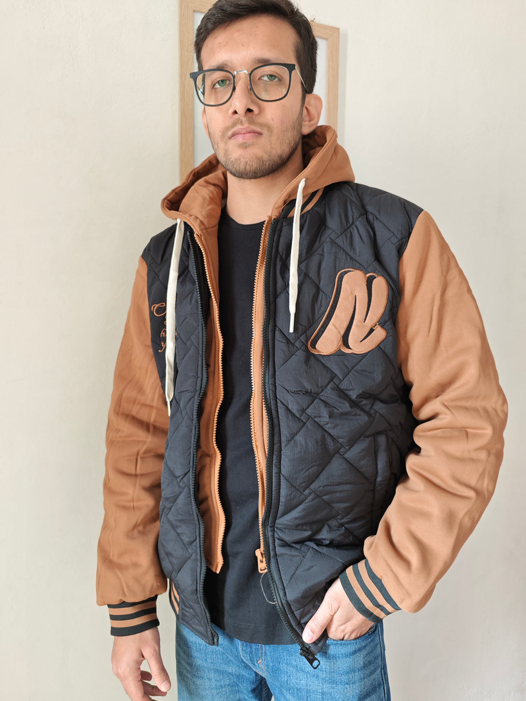 Dual Layer Hooded Jacket.