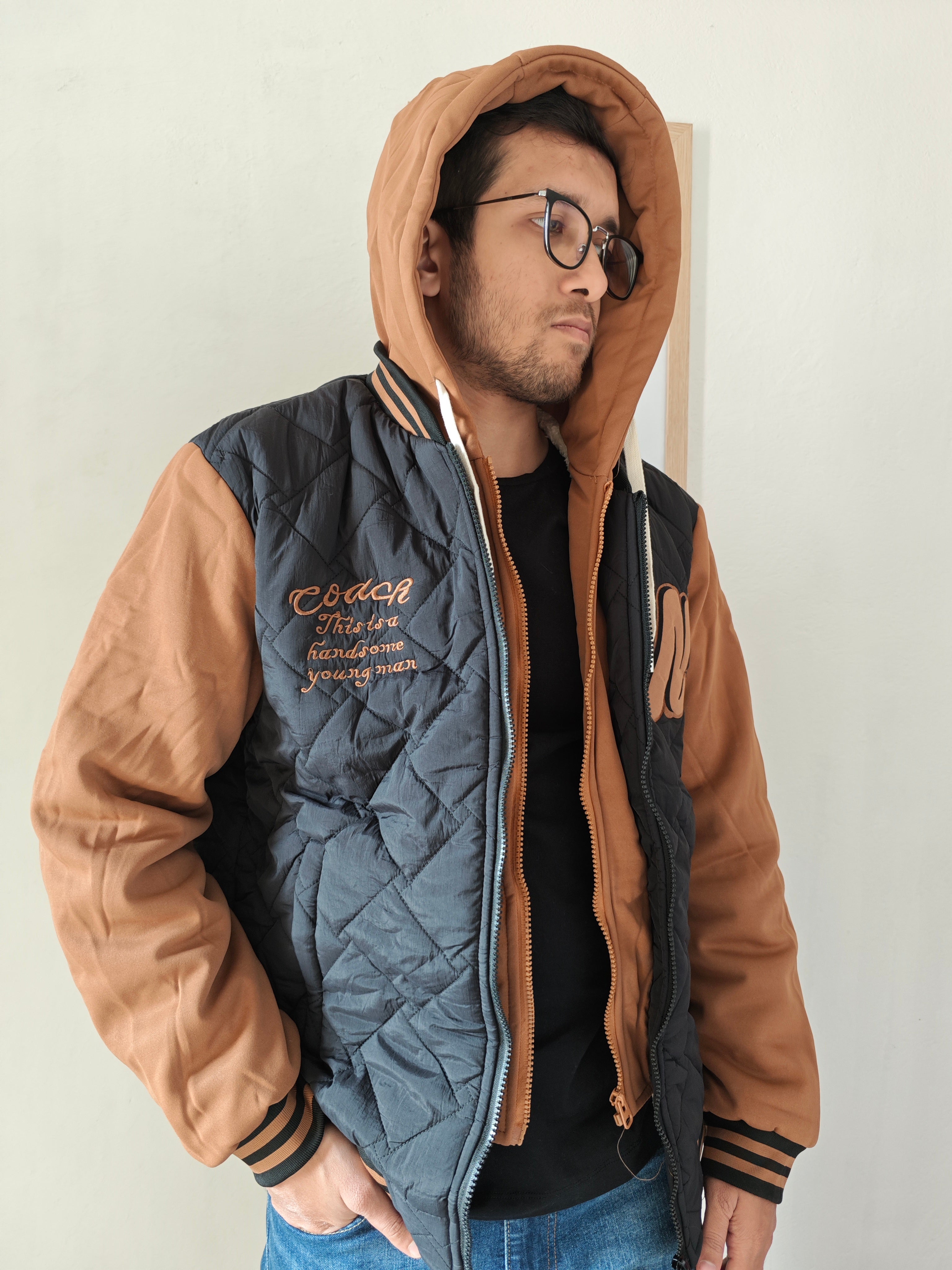 Dual Layer Hooded Jacket.