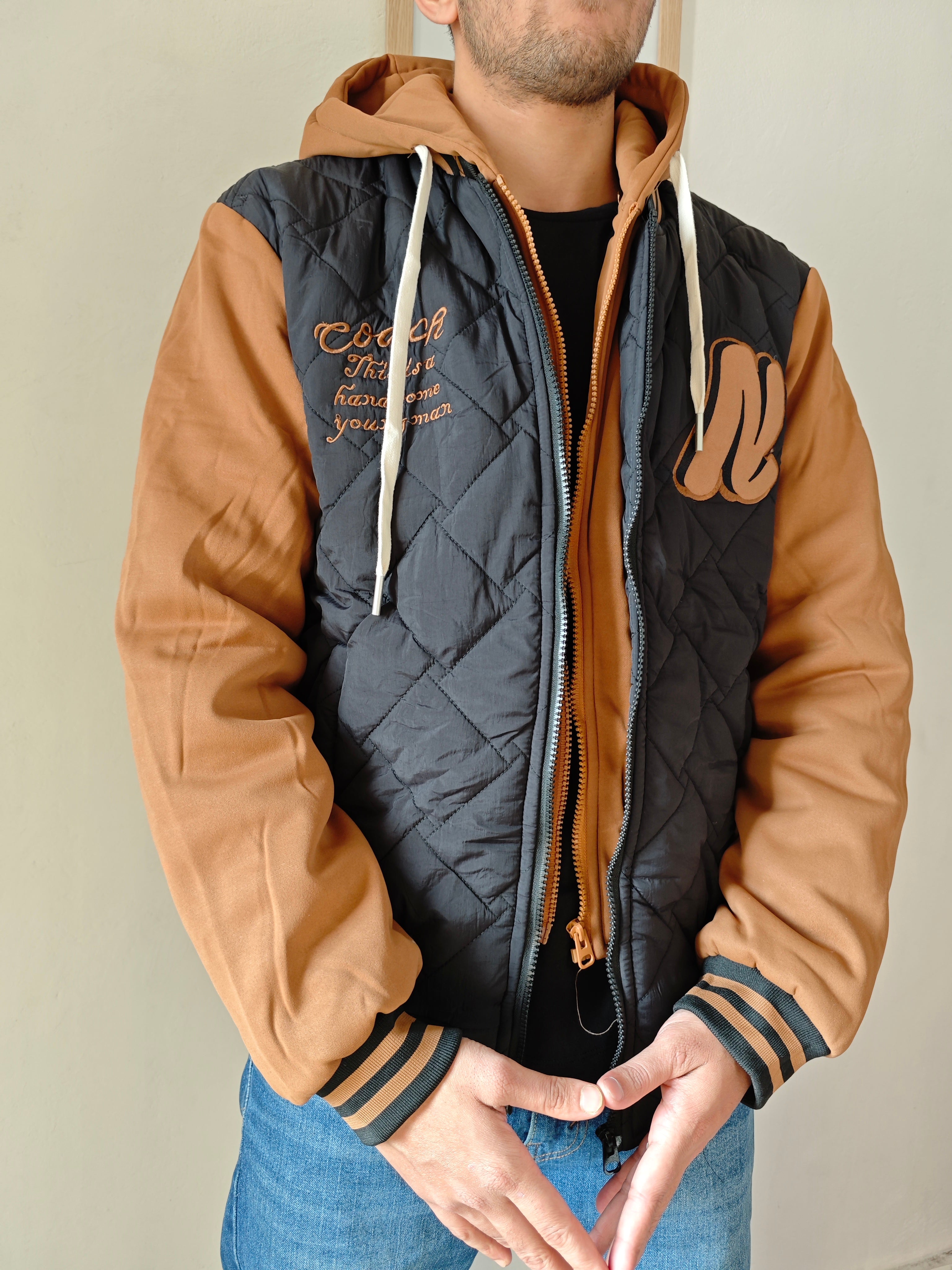 Dual Layer Hooded Jacket.